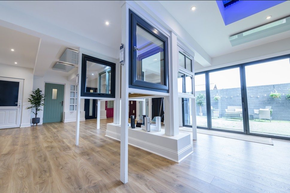 Inside the Balhousie Glazing showroom in Perth, showing window and door displays in a range of colours and styles
