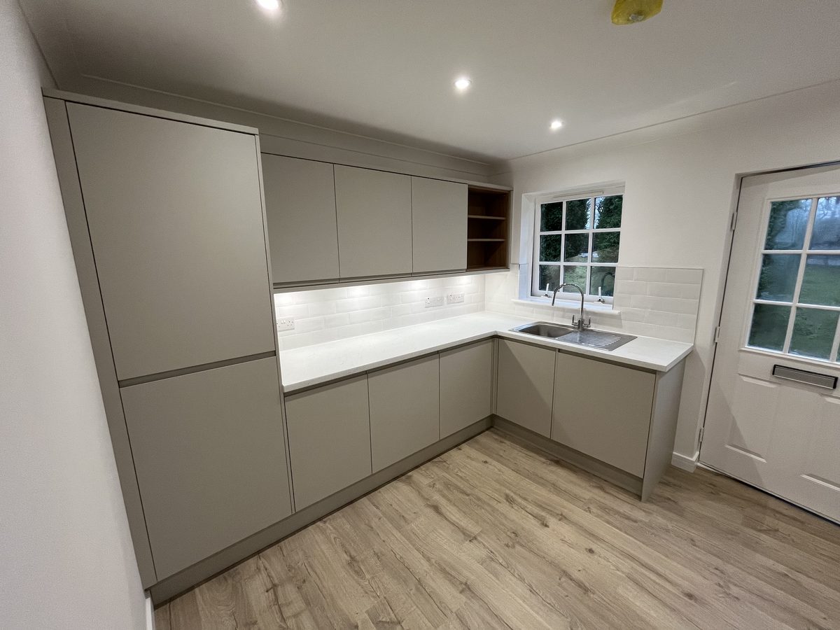 A handleless fitted kitchen installed by Concept Joiners in Bishopbriggs, East Dunbartonshire