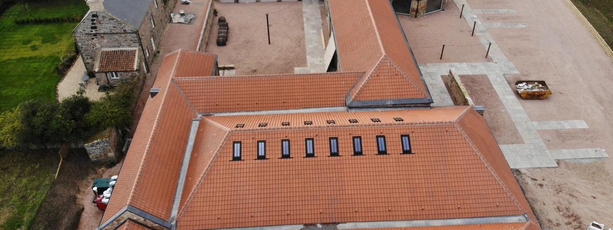 The finished Fallside Mill steading roof near St Andrews, re-roofed in clay pantiles by Ian Barrett Roofing, Trading Standards vetted Fife Trusted Trader