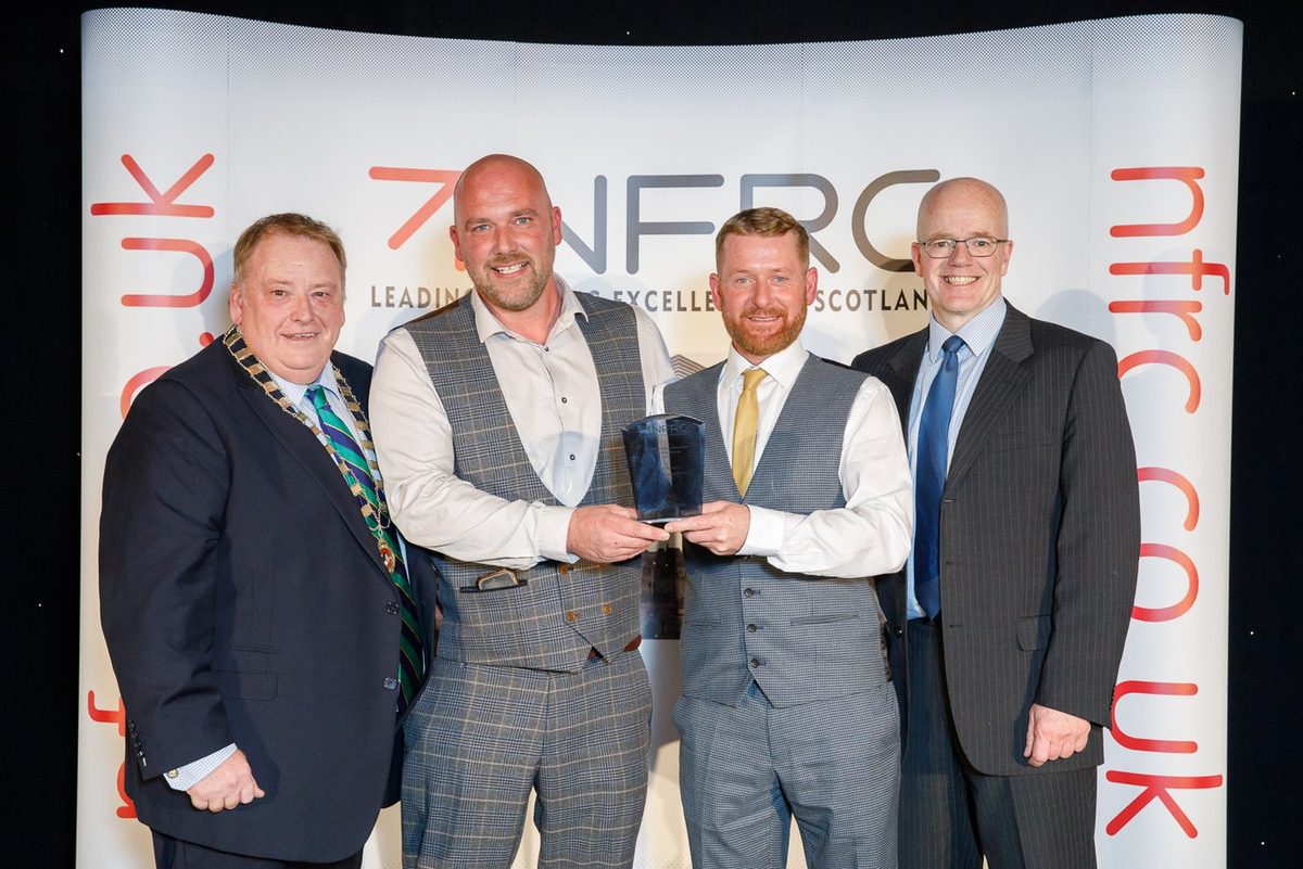 Edinburgh Leadcraft collecting a Scottish NFRC Roofing Award