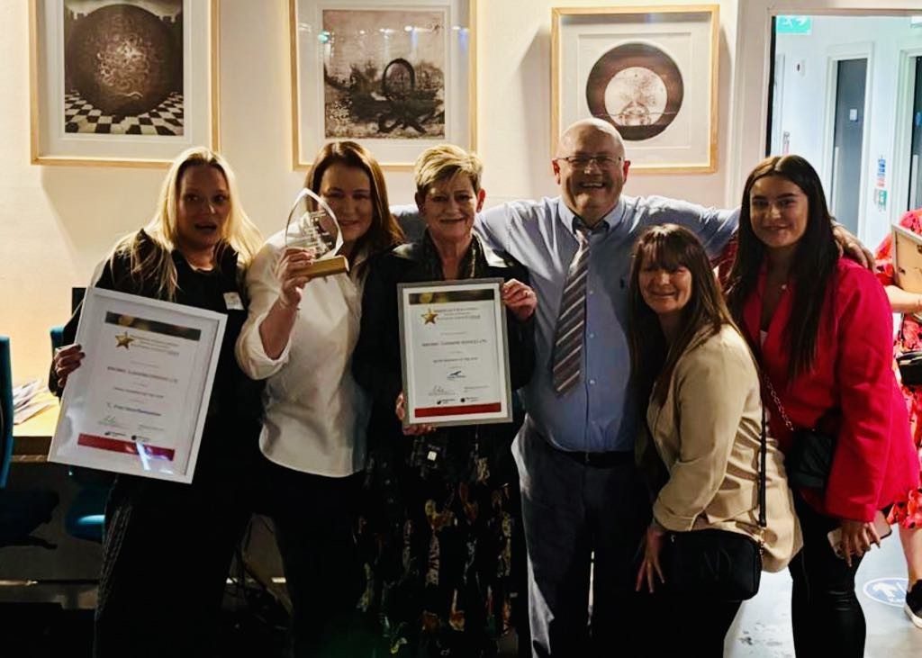 The MacMac Cleaning Services team celebrating Family Business of the Year 2025 at the Midlothian and East Lothian Chamber of Commerce Awards