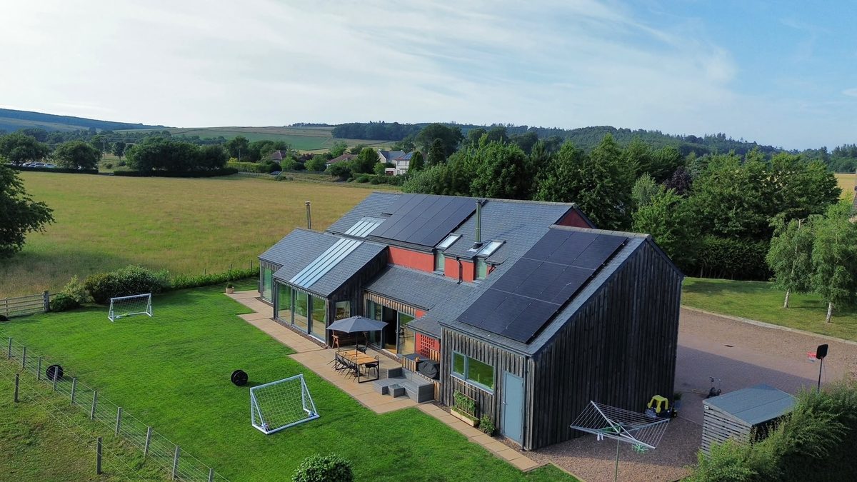 A recent S and P Renewables solar PV installation on a converted steading in the Scottish Borders, with panels across two roof pitches